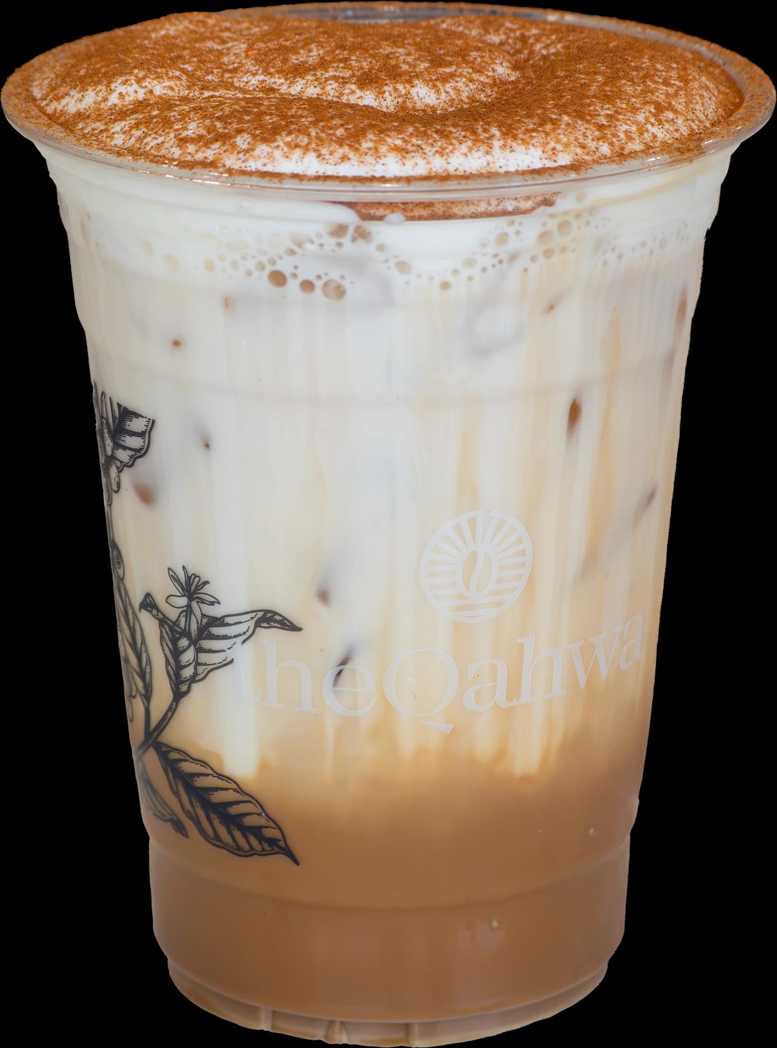 Iced Spanish Latte with tiramisu cold foam in a clear theQahwa cup — sweetened condensed milk and espresso layered under a thick mascarpone foam top dusted with cocoa.